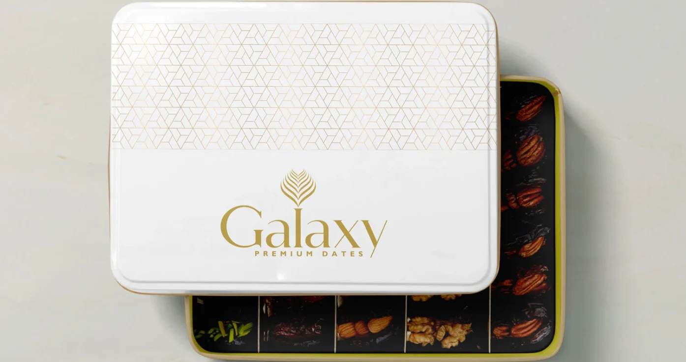 DesignDeus designed a refined brand identity for Galaxy Premium Dates, including logo and premium product packaging.