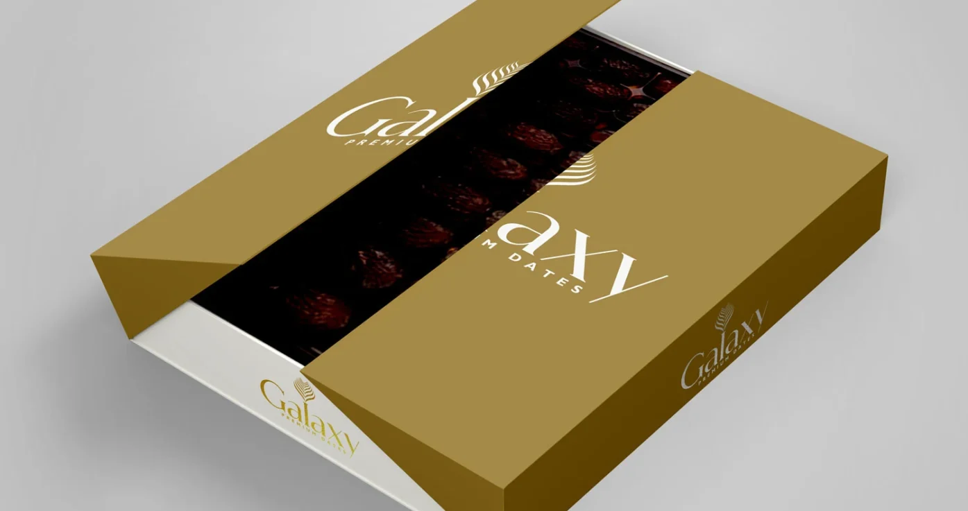 DesignDeus designed a refined brand identity for Galaxy Premium Dates, including logo and premium product packaging.