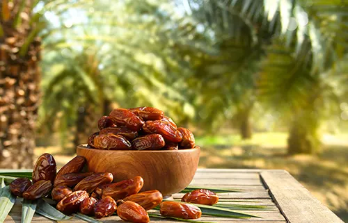 DesignDeus designed a refined brand identity for Galaxy Premium Dates, including logo and premium product packaging.